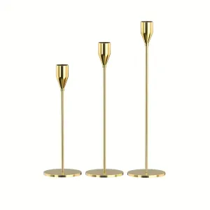 Нібір підсвічників золотий